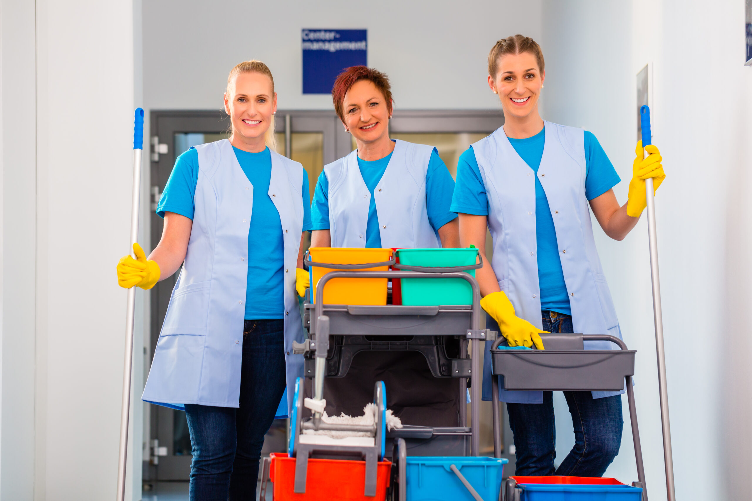 Cleaning service at work, tree women in teamwork